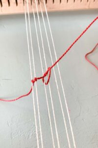 hoe weef je een armband begin met een knoop