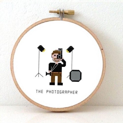 fotograaf man kruissteek patroon