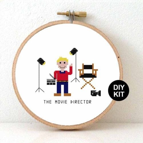 man filmregisseur kruissteek borduurpakket