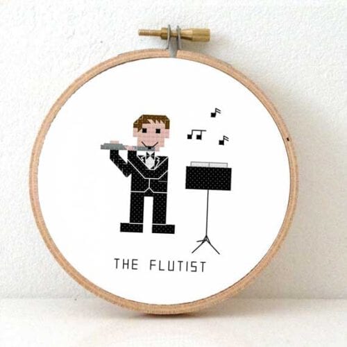 mannelijke fluitist kruissteek patroon