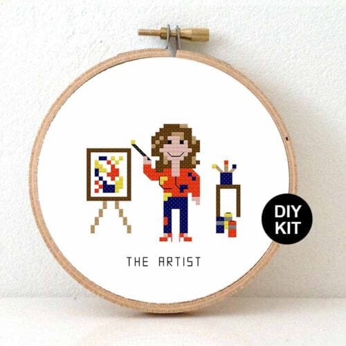 vrouw kunstenares kruissteek borduurpakket