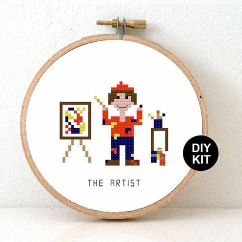 man kunstenaar kruissteek borduurpakket