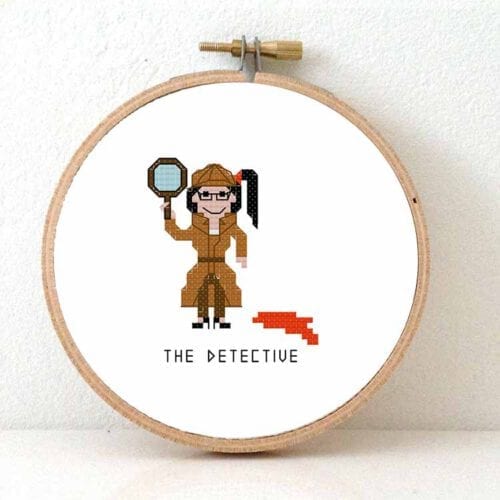 vrouw detective kruissteek patroon