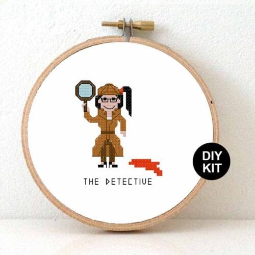 vrouw detective kruissteek borduurpakket