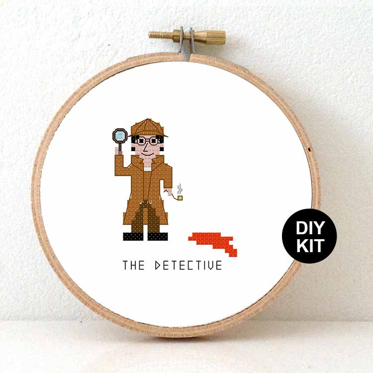 man detective kruissteek borduurpakket