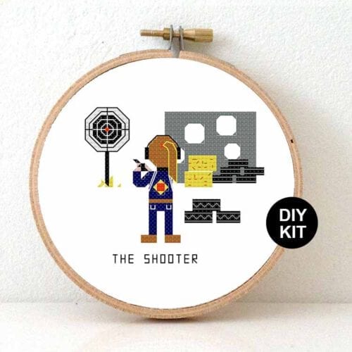 female shooting sporter cross stitch kit