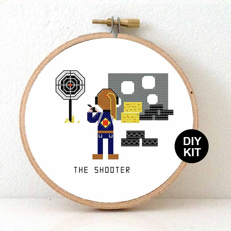 vrouw schutter sport kruissteek borduurpakket