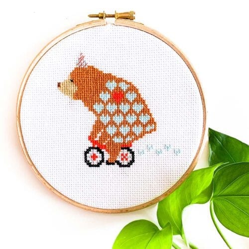 Beer op fiets kruissteek patroon