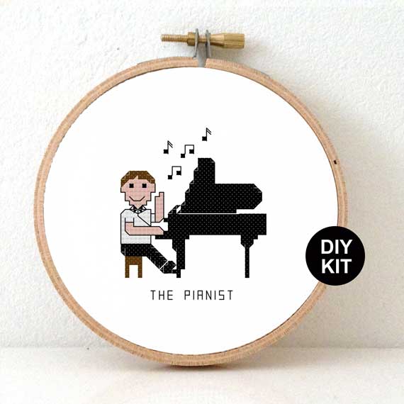 man pianist kruissteek pakket