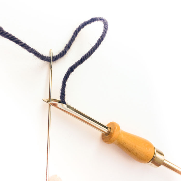 hoe de draad doorhalen op je houten verstelbare punchnaald