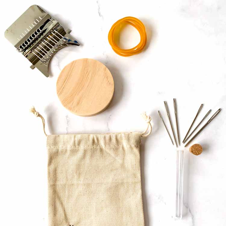 wooden speedweave tool with 10 hooks for quickly mending clothes