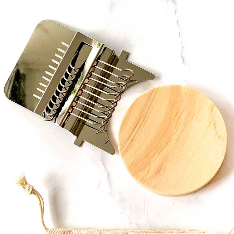 wooden speedweave tool with 10 hooks for quickly mending clothes