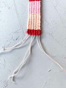 how to weave a bracelet taking it from the loom braiding