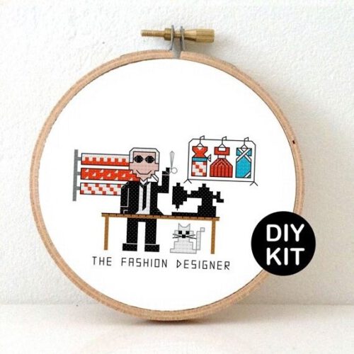 man modeontwerper kruissteek borduurpakket