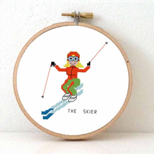 Female skier cross stitch pattern